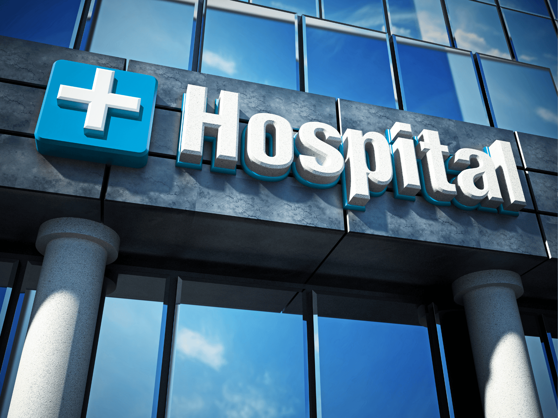 Hospital building exterior symbolizing healthcare facilities requiring proper ventilation and infection control.